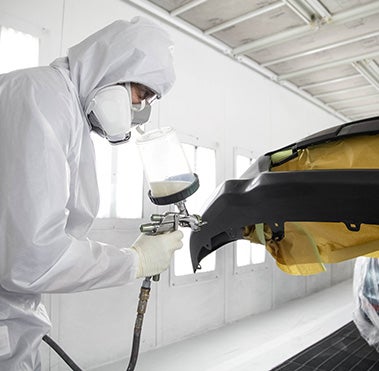 Collision Center Technician Painting a Vehicle | City Toyota in Great Falls MT