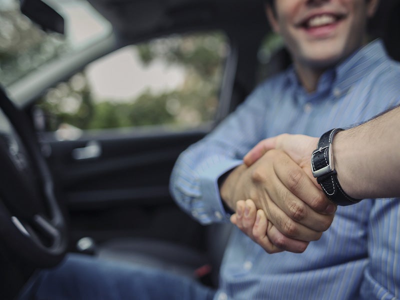City Toyota in Great Falls MT customer shaking hands with sales rep